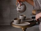 STC cup "Shell" -organic natural shape stoneware in grey | Drinkware by Laima Ceramics. Item composed of stoneware in minimalism style