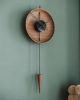 Orbit | Clock in Decorative Objects by MCLOCKS. Item made of wood with steel