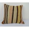 Vintage Faded Color Striped Turkish Kilim Pillow | Cushion in Pillows by Vintage Pillows Store. Item made of wool