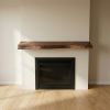 Live edge wood fireplace mantle shelf | Shelving in Storage by Ironscustomwood