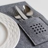 Rectangle grey felt placemats with cutlery pocket. Set of 2 | Tableware by DecoMundo Home. Item made of fabric with leather works with minimalism & modern style