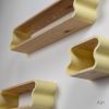 Squiggle Floating Shelves: Cherry & Ash Hardwood, Pastel Accents | Shelving in Storage by Spacecraft Furnishing