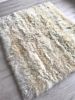 Ivory Plush Sheepskin Bed Cover / Rug | Area Rug in Rugs by East Perry. Item composed of wool