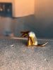 Grooming Cat in Gold | Sculptures by YENNY COCQ