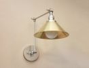 Swinging Adjustable Wall Light - Industrial Brushed Nickel | Sconces by Retro Steam Works. Item made of metal works with mid century modern & industrial style