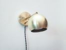 Pivoting Head Bedside Reading Wall Light, Orange & Gold | Sconces by Retro Steam Works. Item composed of fabric and metal in mid century modern or industrial style