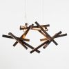 INTERSTELLAR chandelier | Chandeliers by Next Level Lighting. Item composed of wood
