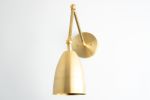 Articulating Sconce - Model No. 0107 | Sconces by Peared Creation. Item composed of brass