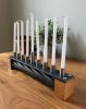 Reclaimed Ski Chairlift Cable Menorah: Industrial Steel, Cherry Wood Skier Gift | Candle Holder in Decorative Objects by industrial comfort. Item made of wood with steel works with contemporary & industrial style