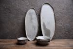 Tapas SET - textured open bowls x3 , natural shape elongated | Plate in Dinnerware by Laima Ceramics. Item composed of stoneware in minimalism style