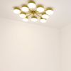 Celeste Epoch | Chandeliers by DESIGN FOR MACHA. Item composed of brass and glass