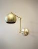 Kitchen Shelves Adjustable Wall Light - Industrial Sconce | Sconces by Retro Steam Works. Item made of brass works with mid century modern & industrial style