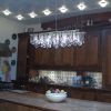 Industrial Banqueting Linear Suspension Blk Steel Chandelier | Chandeliers by Michael McHale Designs. Item composed of metal and glass