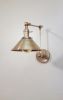 Swing Arm Adjustable Wall Light - Antique Brass | Sconces by Retro Steam Works. Item composed of metal compatible with industrial style
