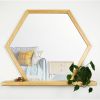 Hexagon Mirror with Wooden Shelf | Decorative Objects by Dot & Rose. Item made of maple wood & glass