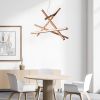 Nebula 5 | Chandeliers by Next Level Lighting. Item composed of wood