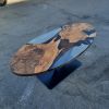 Custom Walnut Epoxy Oval Dining Table | Tables by Ironscustomwood. Item made of walnut & metal