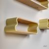 Squiggle Floating Shelves: Cherry & Ash Hardwood, Pastel Accents | Shelving in Storage by Spacecraft Furnishing