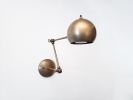 LED Adjustable Wall Globe Sconce - Industrial Ball Light | Sconces by Retro Steam Works. Item composed of brass in industrial style
