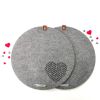 Round, modern grey felt placemats with heart. Set of 2 | Tableware by DecoMundo Home. Item composed of fabric and aluminum in minimalism or mid century modern style