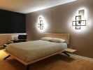 Trinity wall sconce | Sconces by Next Level Lighting | Lopesan Baobab Resort, Gran Canaria Spain in Meloneras. Item composed of oak wood