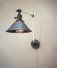 Swinging Adjustable Wall Light - Industrial Sconce | Sconces by Retro Steam Works. Item composed of metal compatible with mid century modern and industrial style