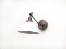 Swing Arm Bedside Reading Wall Light - Gunmetal Patina | Sconces by Retro Steam Works. Item composed of metal in industrial style