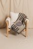 The BLACKRAINBOW Woven Throw Blanket | Unique Decor | Linens & Bedding by Parker Heath | PAR  KER made. Item composed of cotton and fiber in boho or minimalism style