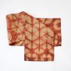 Raffia Shibori Table Runner - Turtle Pattern - Terra Cotta | Linens & Bedding by Tanana Madagascar. Item made of fabric