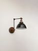 Swing Arm Adjustable Wall Light - Industrial Sconce | Sconces by Retro Steam Works. Item made of metal works with industrial style