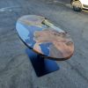 Custom Walnut Epoxy Oval Dining Table | Tables by Ironscustomwood. Item made of walnut & metal