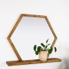 Hexagon Mirror with Wooden Shelf | Decorative Objects by Dot & Rose. Item made of maple wood & glass