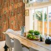 Pinepple And Bamboo | Wallpaper in Wall Treatments by Wallcovetings by Brenda Houston. Item composed of paper