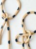 Clay Object 45- Black Polka Dots Circle Bow | Sculptures by OBJECT-MATTER / O-M ceramics