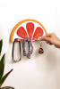 Handmade Blood Orange Slice Key Holder | Rack in Storage by Jubi Rugs. Item made of wood with synthetic