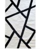 Black Kamilia Handwoven Area Rug | Rugs by Mumo Toronto. Item made of wool
