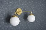 Acton | Sconces by Illuminate Vintage. Item made of brass with glass