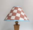 A Pair of Rust & Blue Checkerboard Hand Painted Lampshades | Table Lamp in Lamps by Rosie Gore. Item composed of paper