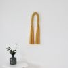 Minimalistic Woven tassel Arch Aarya in sunshine/dusty pink | Macrame Wall Hanging in Wall Hangings by YASHI DESIGNS by Bharti Trivedi. Item composed of fiber