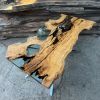 Live edge Clear Epoxy Table made from olive wood | Dining Table in Tables by Ironscustomwood. Item composed of wood and synthetic