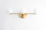 Three Bulb Vanity - Model No. 0518 | Sconces by Peared Creation. Item composed of brass