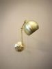 Kitchen Shelves Adjustable Wall Light - Industrial Sconce | Sconces by Retro Steam Works. Item made of brass works with mid century modern & industrial style