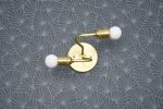 Silverton | Sconces by Illuminate Vintage. Item composed of brass
