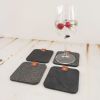 Black and grey stone coasters for cups. Set of 4 | Tableware by DecoMundo Home. Item composed of fabric and stone in minimalism or modern style