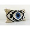 Handmade Ikat Eye Beige Pillow Cover | Cushion in Pillows by Vintage Pillows Store. Item composed of cotton and fiber