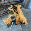 Live edge Clear Epoxy Table made from olive wood | Dining Table in Tables by Ironscustomwood. Item composed of wood and synthetic