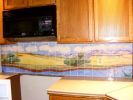 Rocky Mountain Front Kitchen Backsplash | Sculptures by Rachel Kaiser Art. Item composed of cement