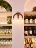 Wall Mount Light CROWN | Sconces by HACHI COLLECTIONS | Ginza Brasserie Grand Bleu in Chuo City. Item made of walnut with brass