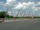 North Ninth Gateway | Public Sculptures by Vicki Scuri SiteWorks | North Ninth Street & Interstate 70, Salina, KS in Salina. Item made of steel