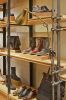 Perimeter Shelving System | Storage by Amuneal | Cole Haan in New York. Item composed of wood and steel